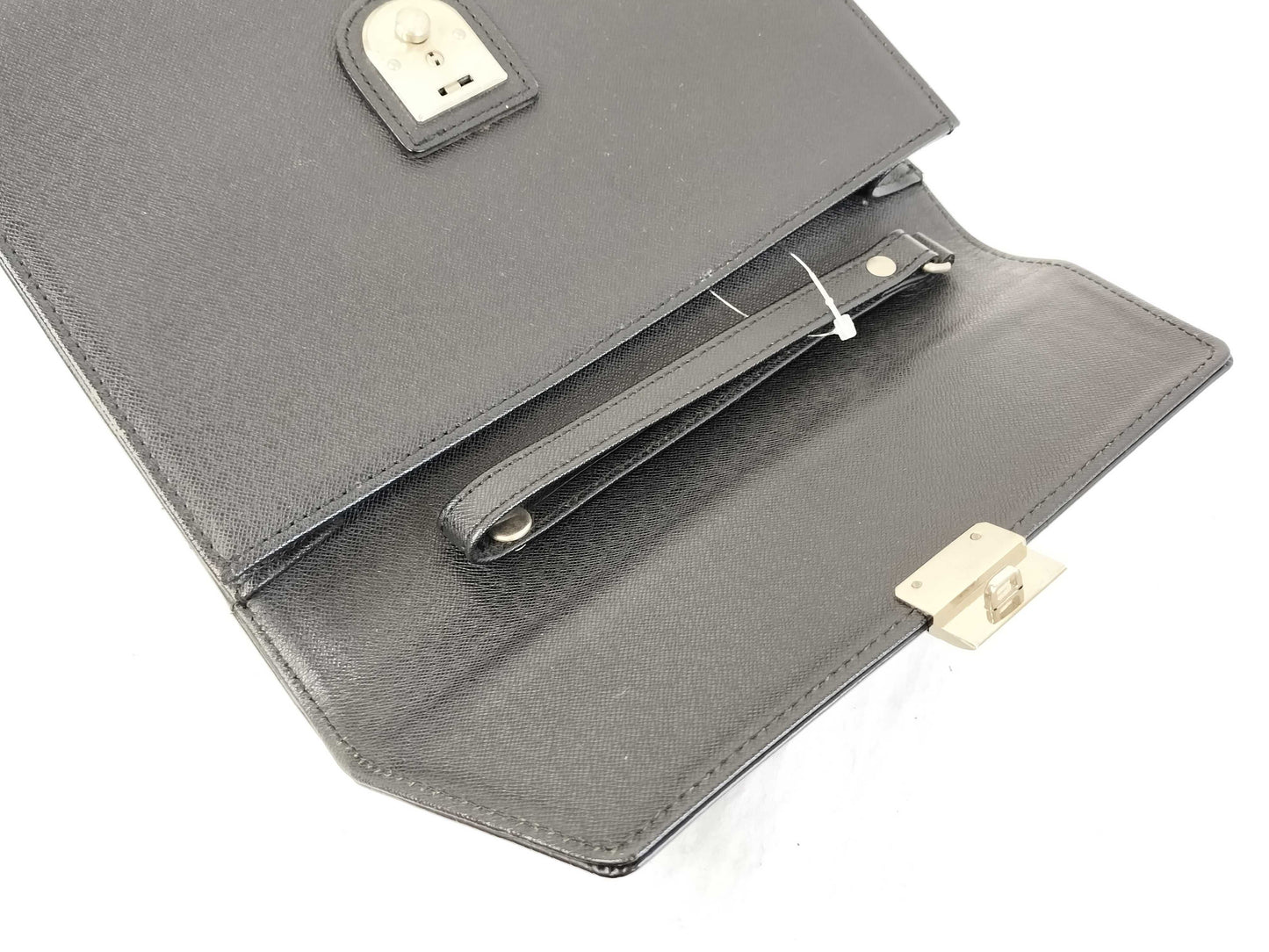 BURBERRY 18. Two Burberry clutches and a second bag