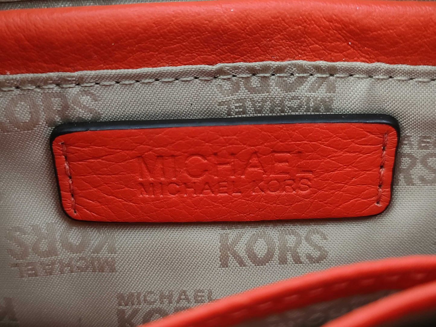 Five beautifully-fitted shoulder bags, including COACH Michael Kors.
