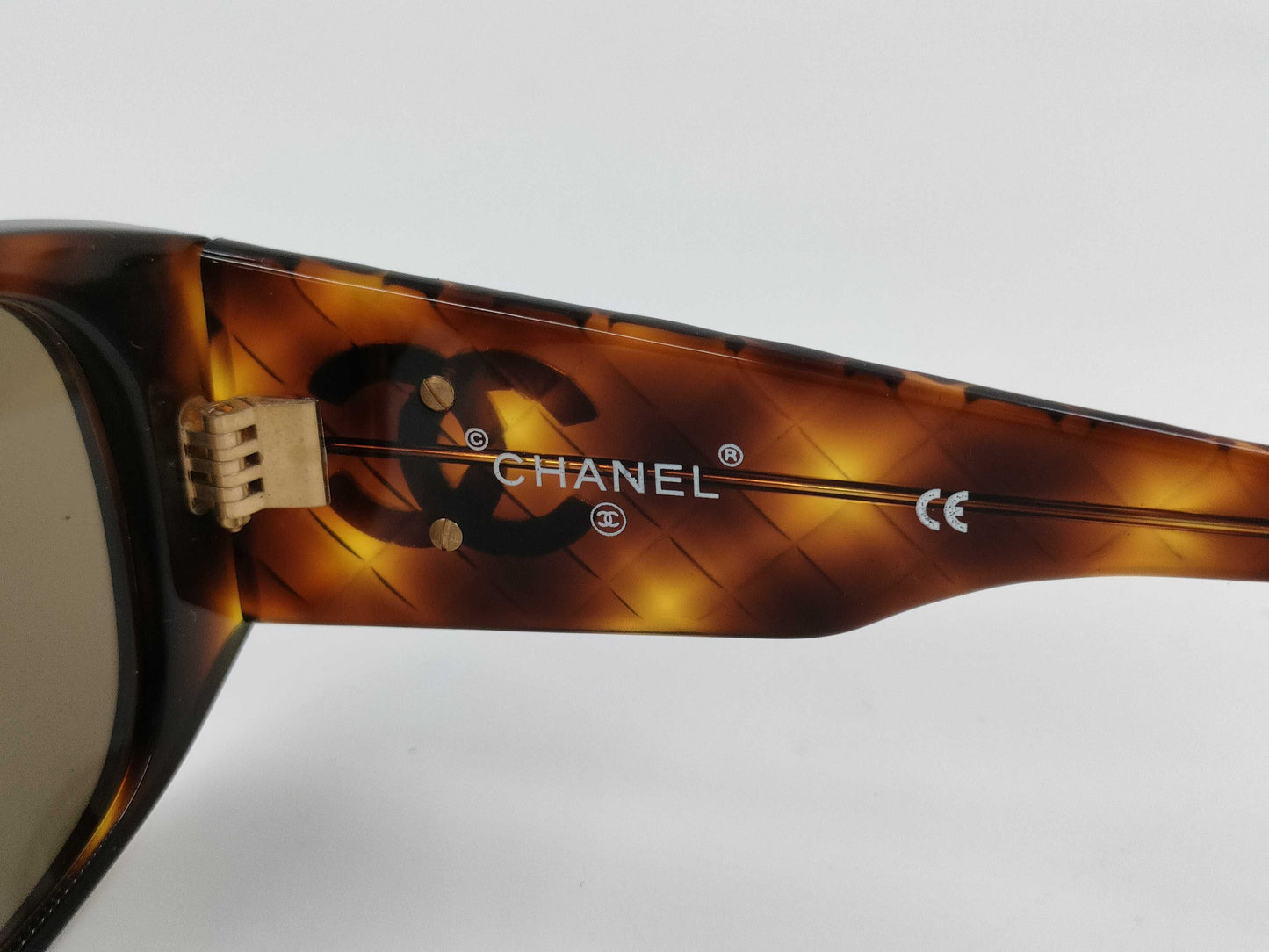 CHANEL tortoiseshell sunglasses with case