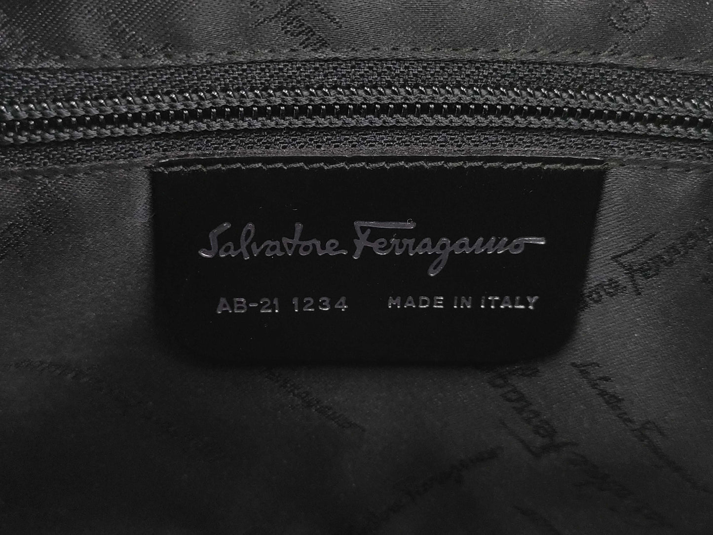 Salvatore Ferragamo Gancini Gancini all-over print leather handbag in black