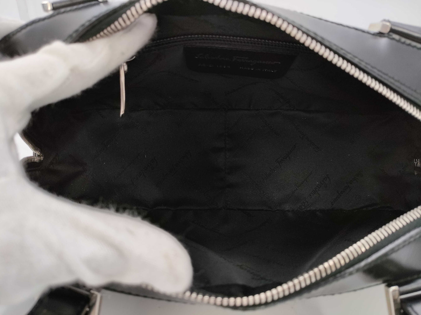 Salvatore Ferragamo Gancini Gancini all-over print leather handbag in black