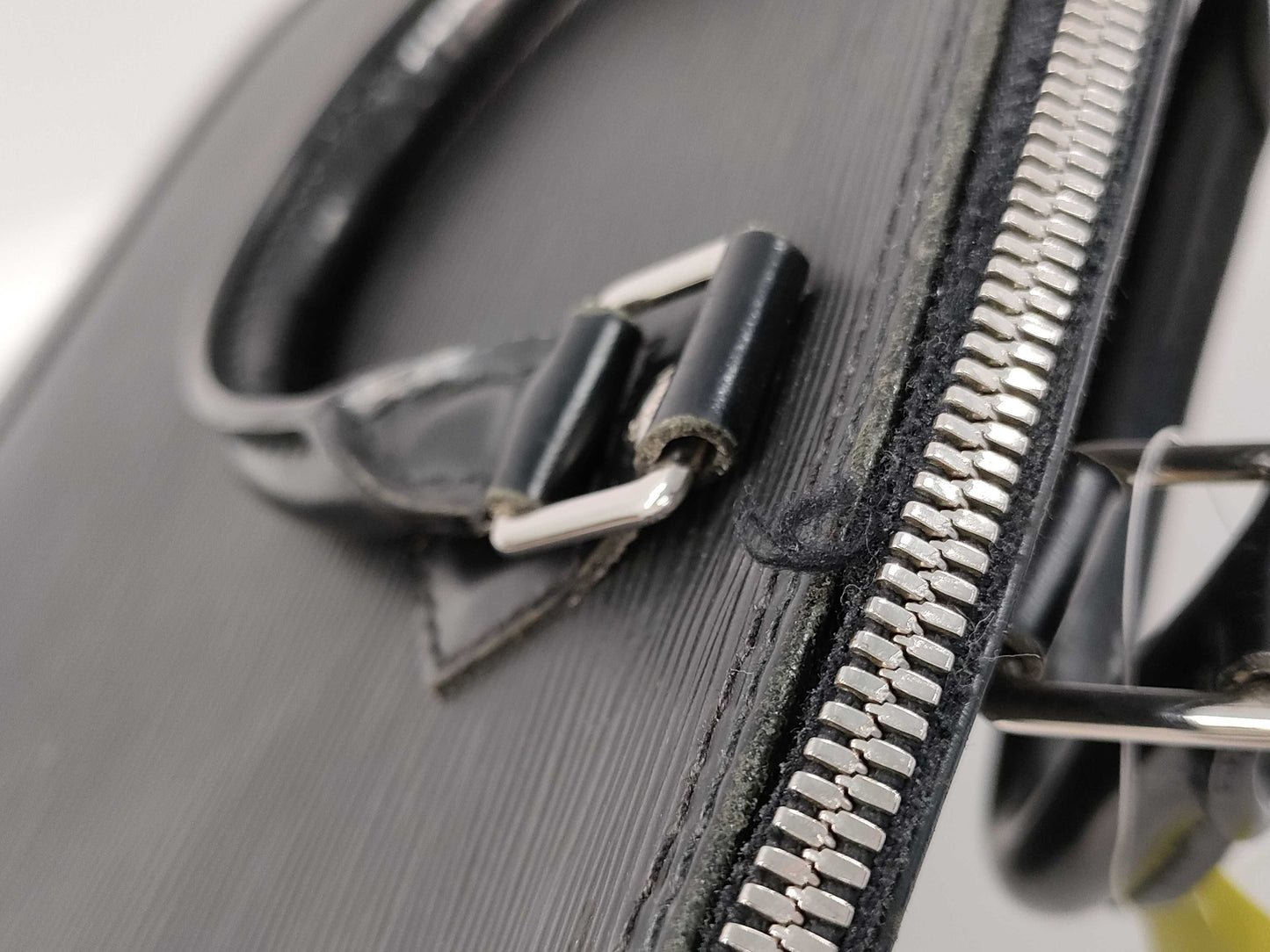 LOUIS VUITTON Epi Alma PM Boston Bag with Cracked Zipper Rail