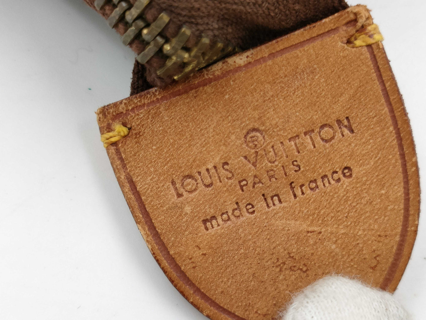 LOUIS VUITTON Monogram Sac Triangle Handbag