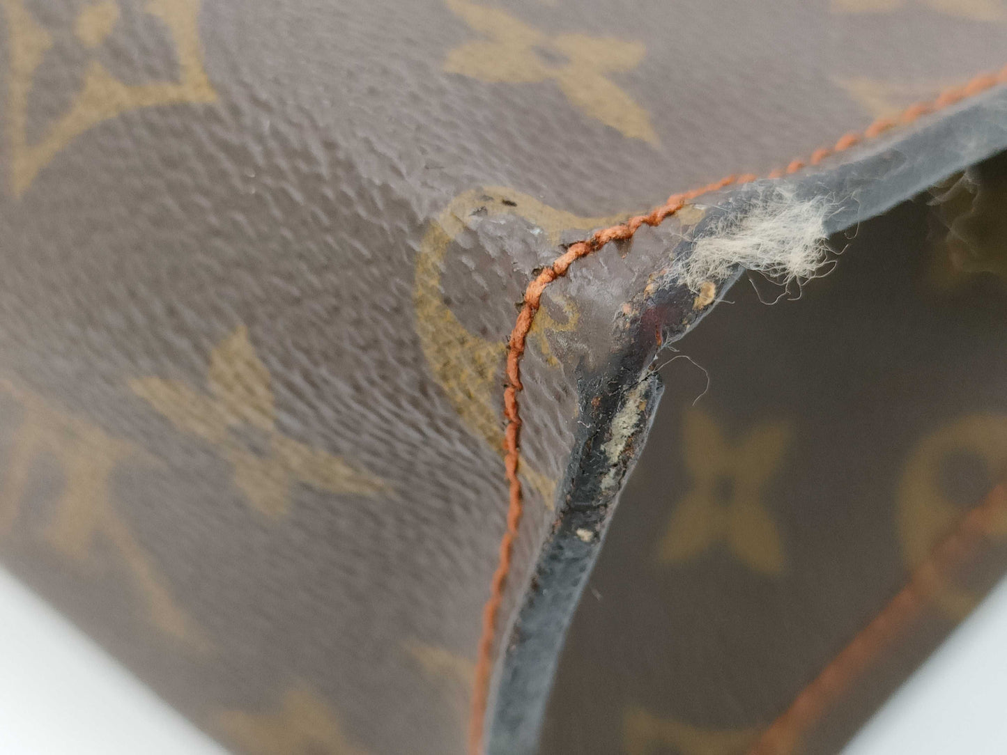 LOUIS VUITTON Monogram Sac Triangle Handbag
