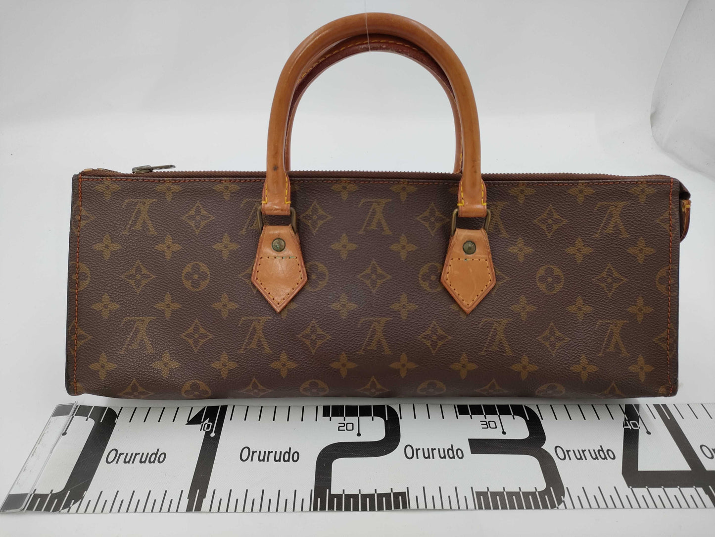 LOUIS VUITTON Monogram Sac Triangle Handbag