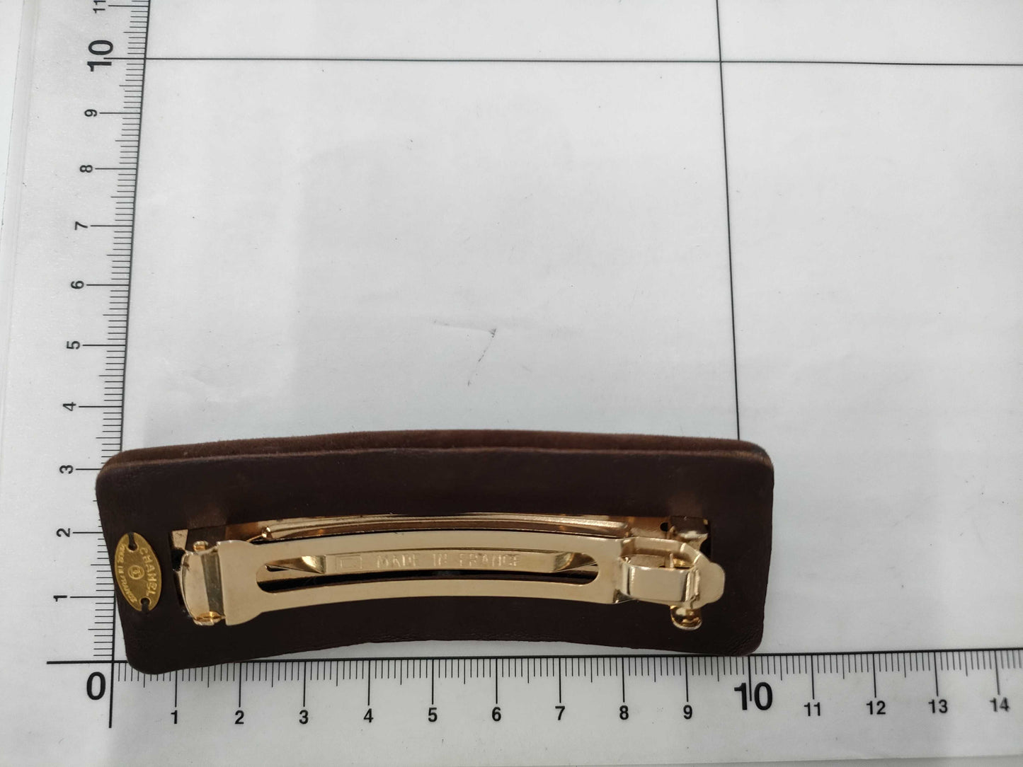CHANEL Turnlock Suede Barrette Hair Accessory