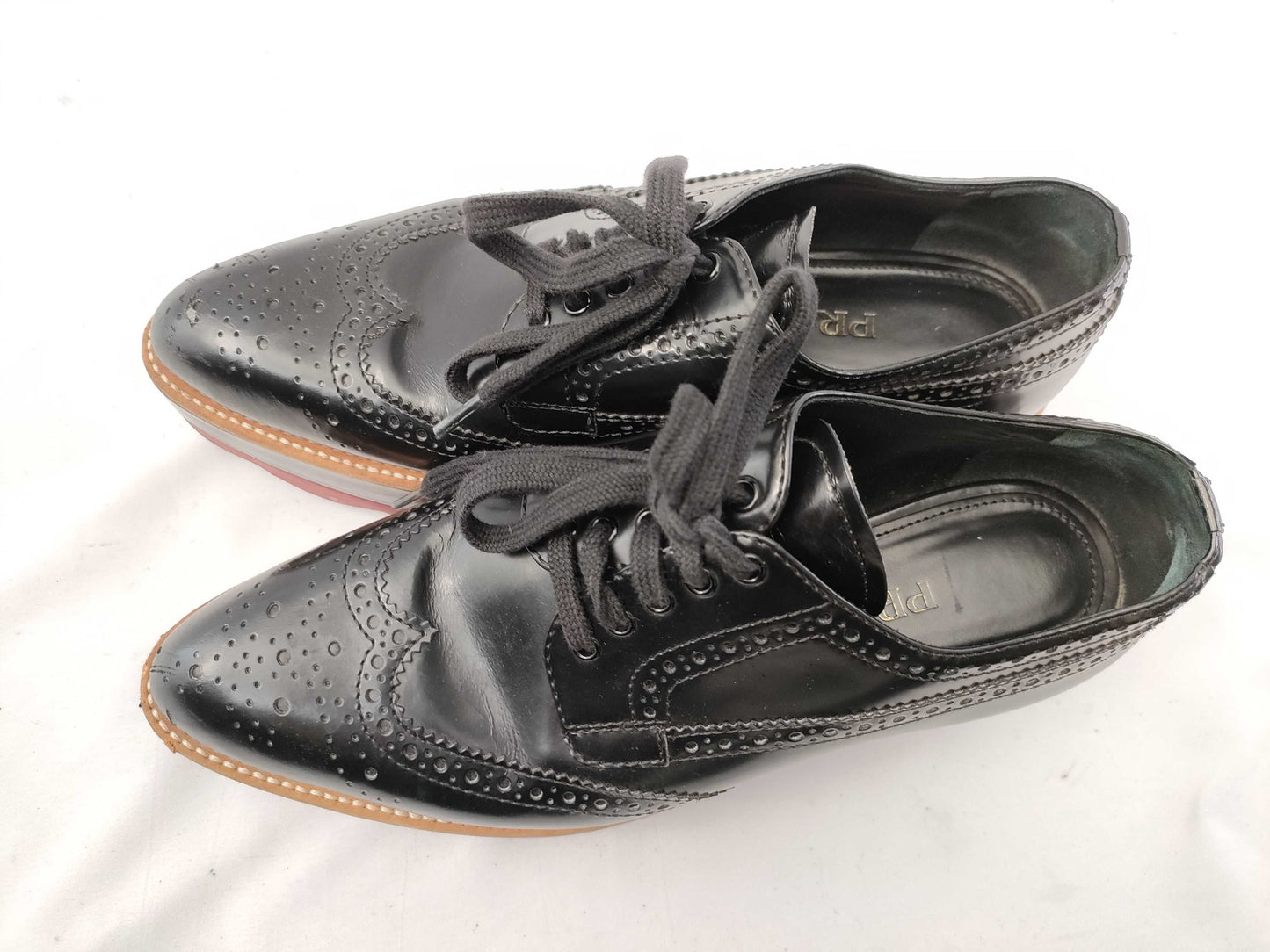 PRADA Wingtip Loafers