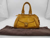 CELINE Leather Handbag with Macadam Logo, Yellow