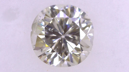 0.687ct K SI-2 POOR/GD/FR MEDIUM BLUE NATURAL 5.39-5.58X3.69mm Diamond Loose