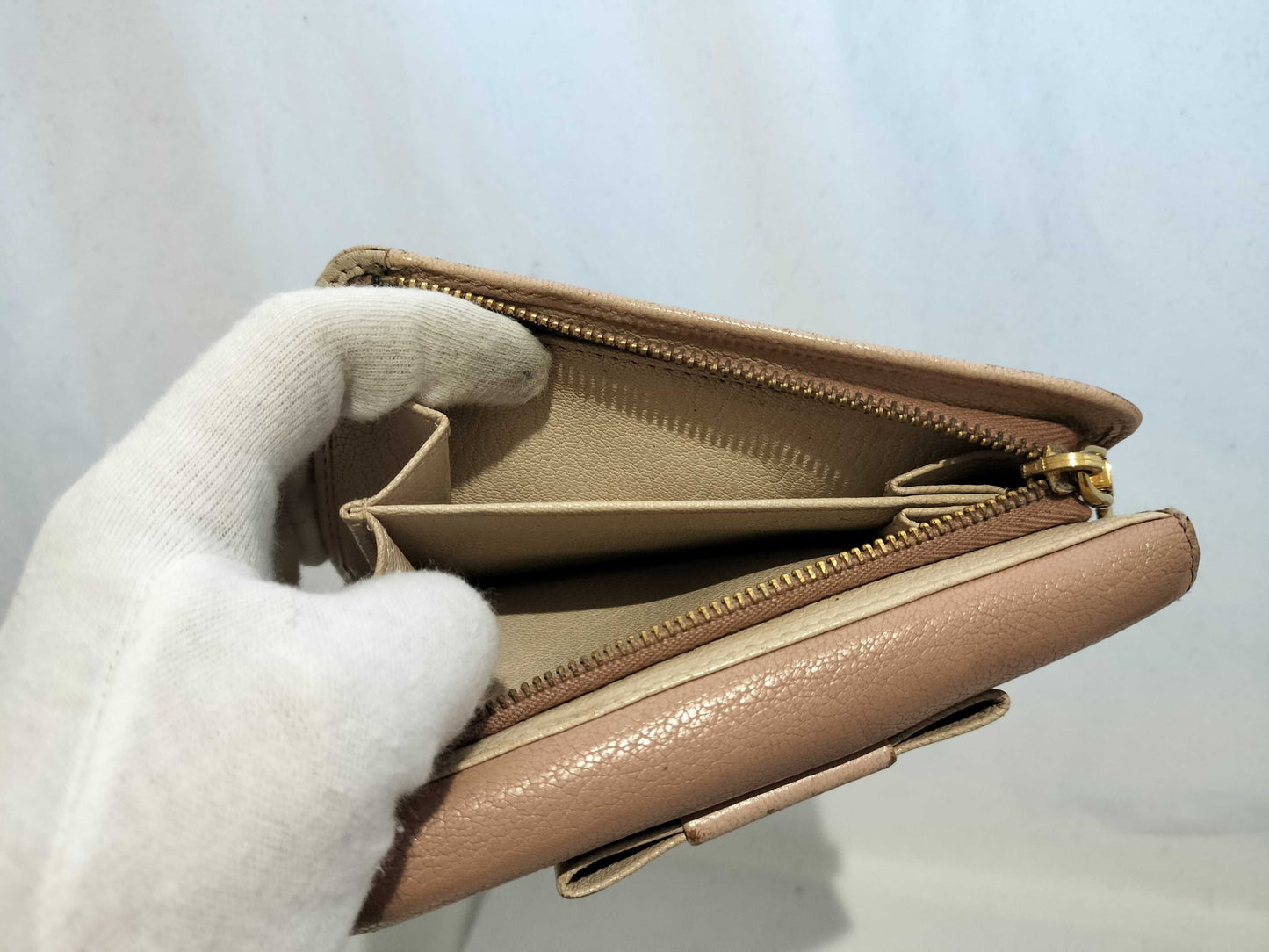 5-piece women's wallet featuring CHANEL, Coco Mark, Miu Miu, and other items.