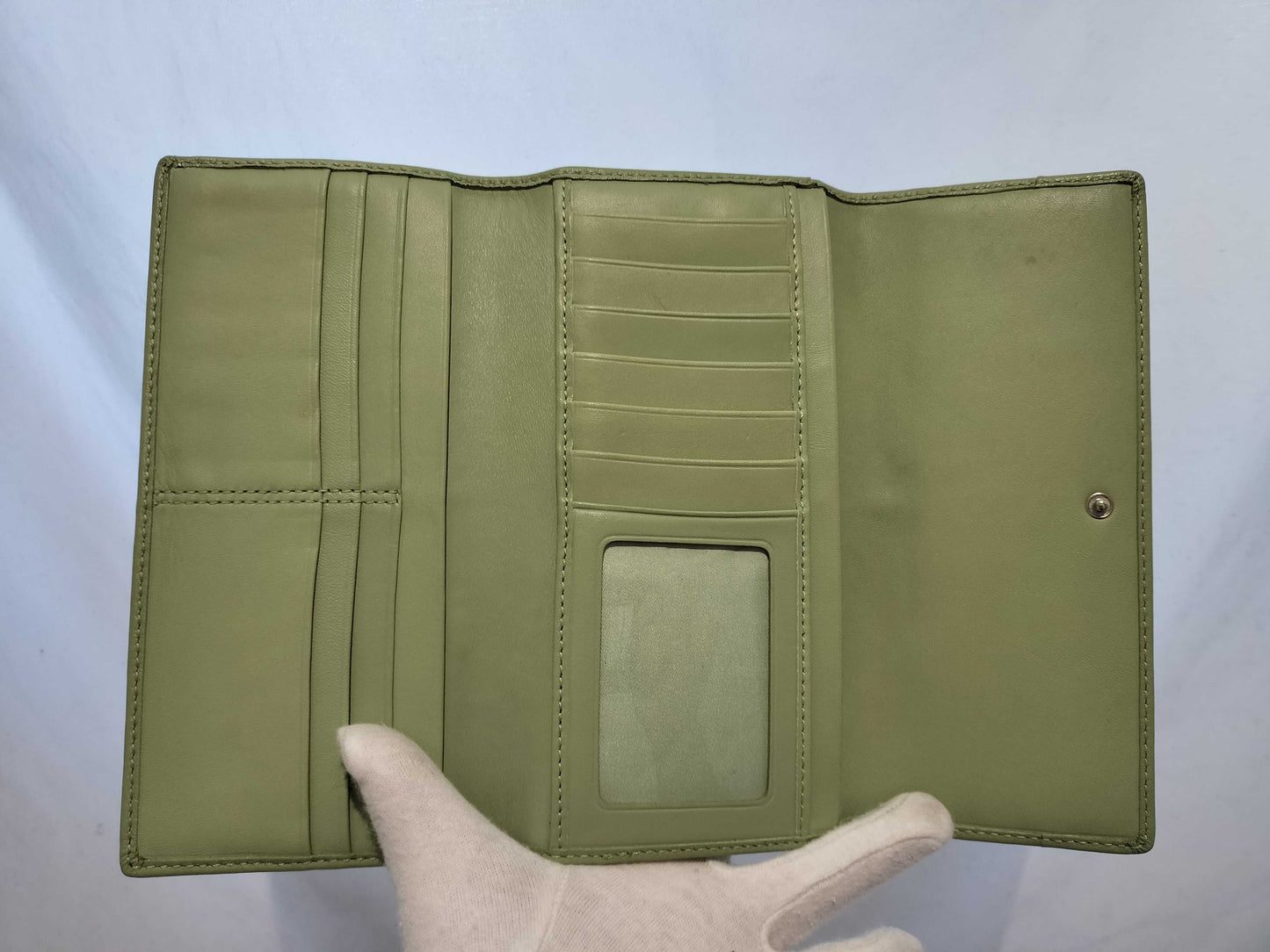 5-piece women's wallet featuring CHANEL, Coco Mark, Miu Miu, and other items.