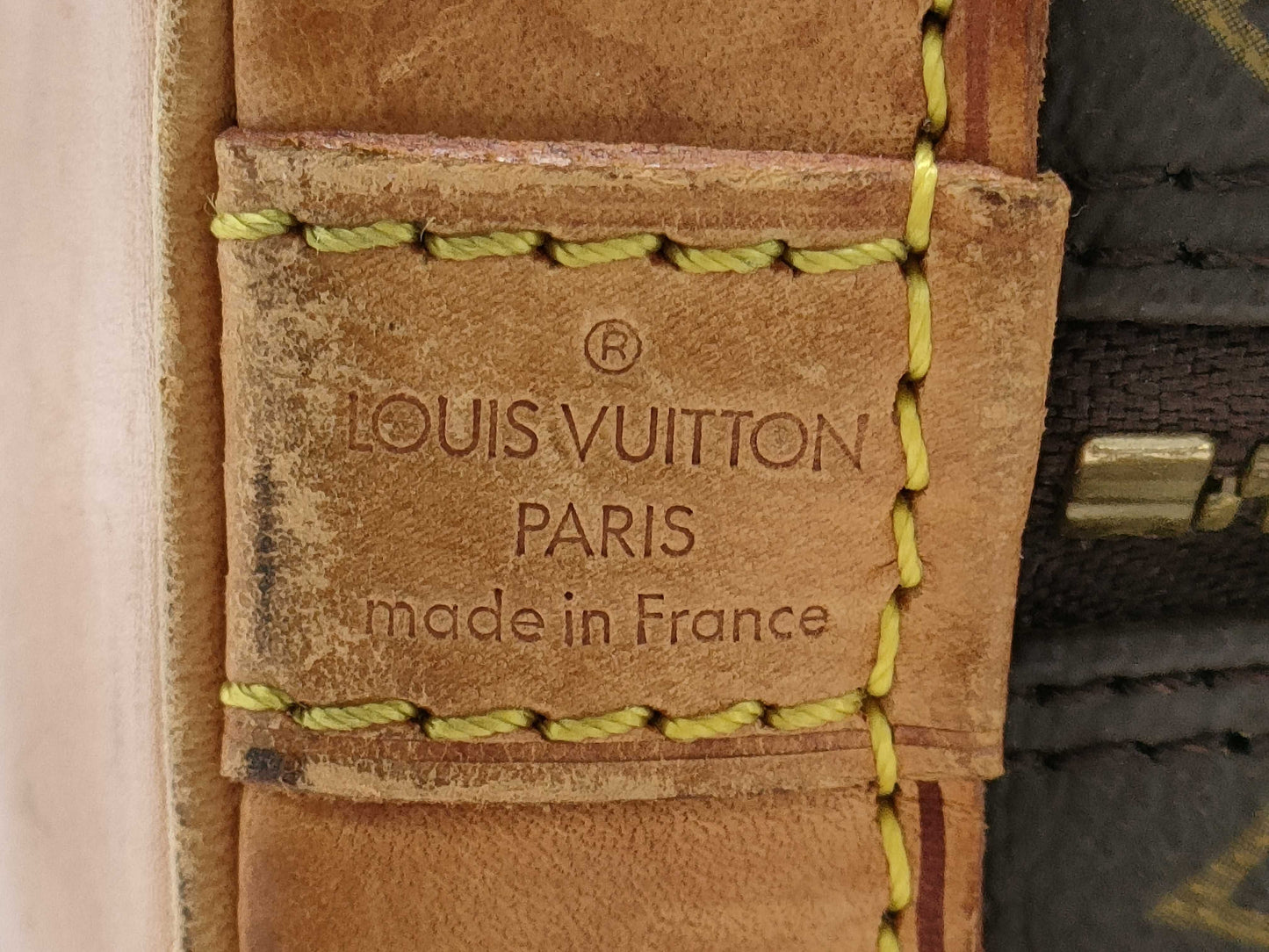 LOUIS VUITTON Monogram Alma Handbag