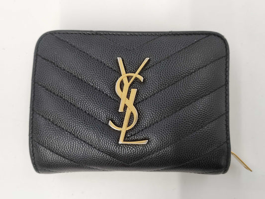 Yves Saint Laurent Bifold Wallet with Caviar, Gold Hardware, Logo, and a Tear