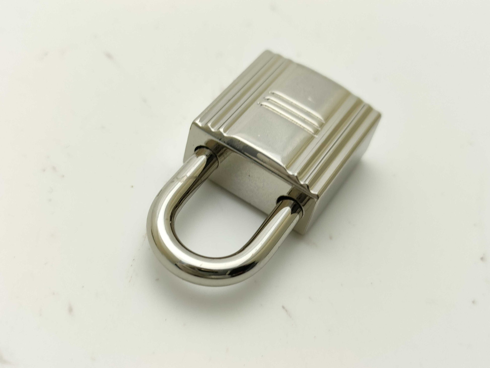 LOUIS VUITTON Padlock/Hermès Cadena and other accessories
