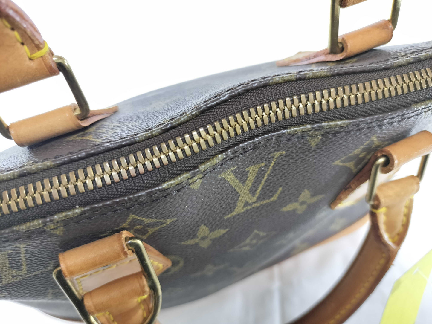 LOUIS VUITTON Monogram Alma PM Handbag