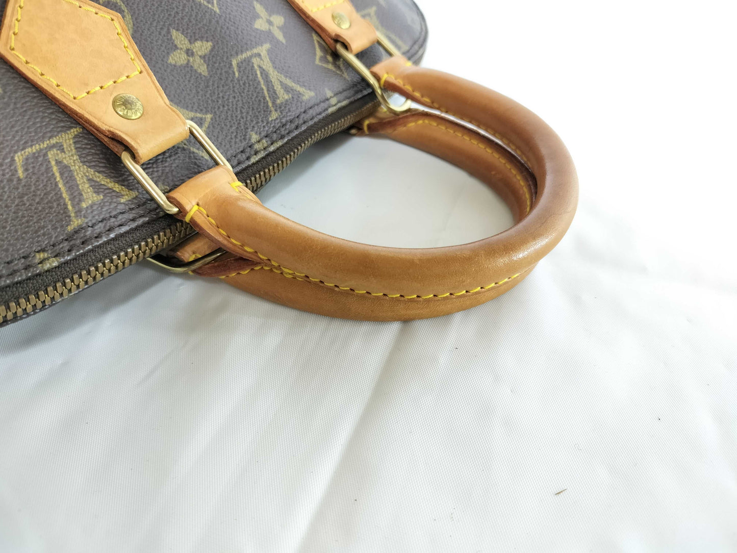 LOUIS VUITTON Monogram Alma PM Handbag