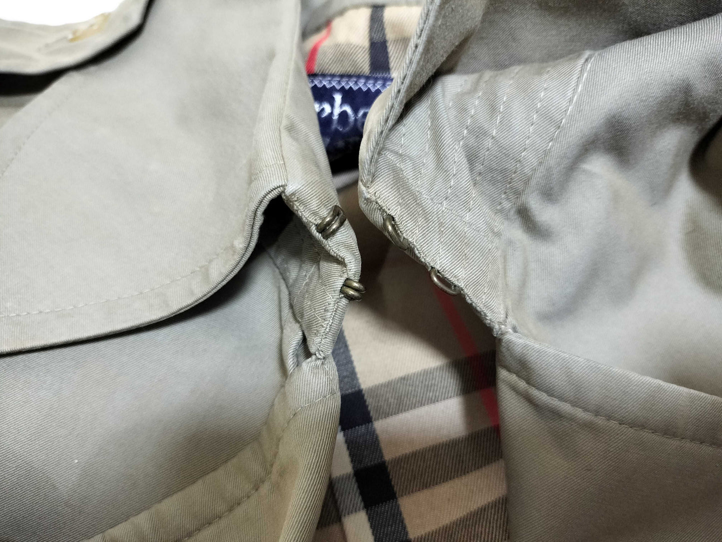 BURBERRY trench coat, stains and signs of wear.