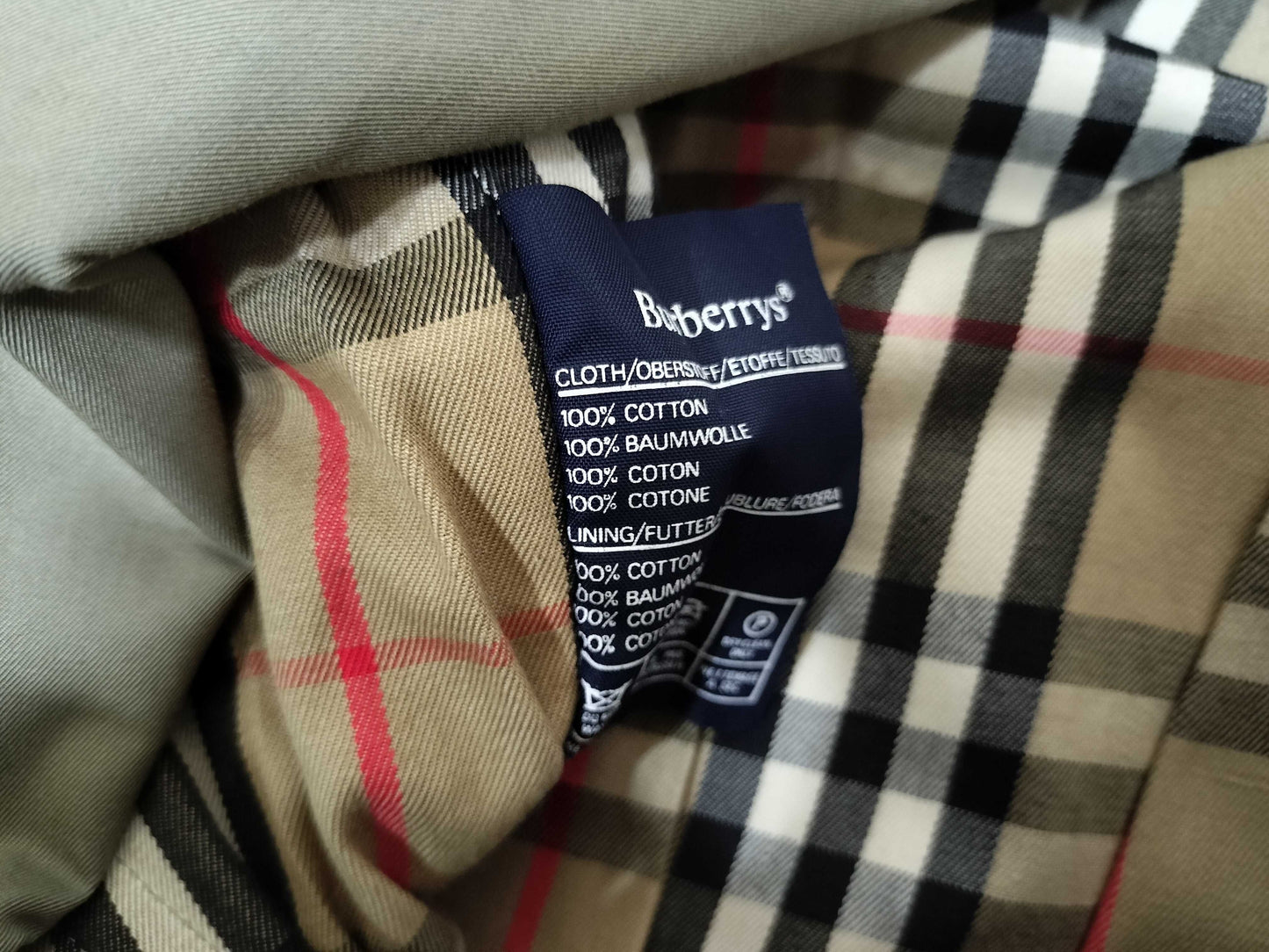 BURBERRY trench coat, stains and signs of wear.
