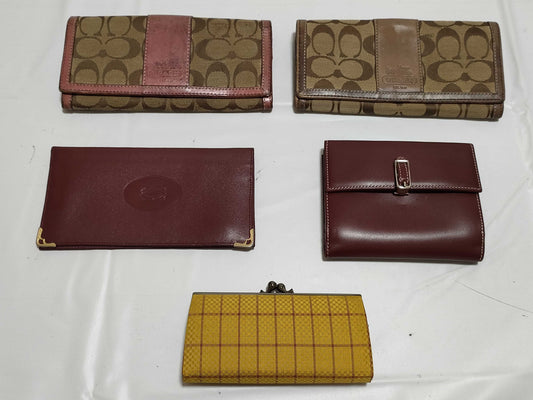 5-piece wallet set including COACH and Cartier