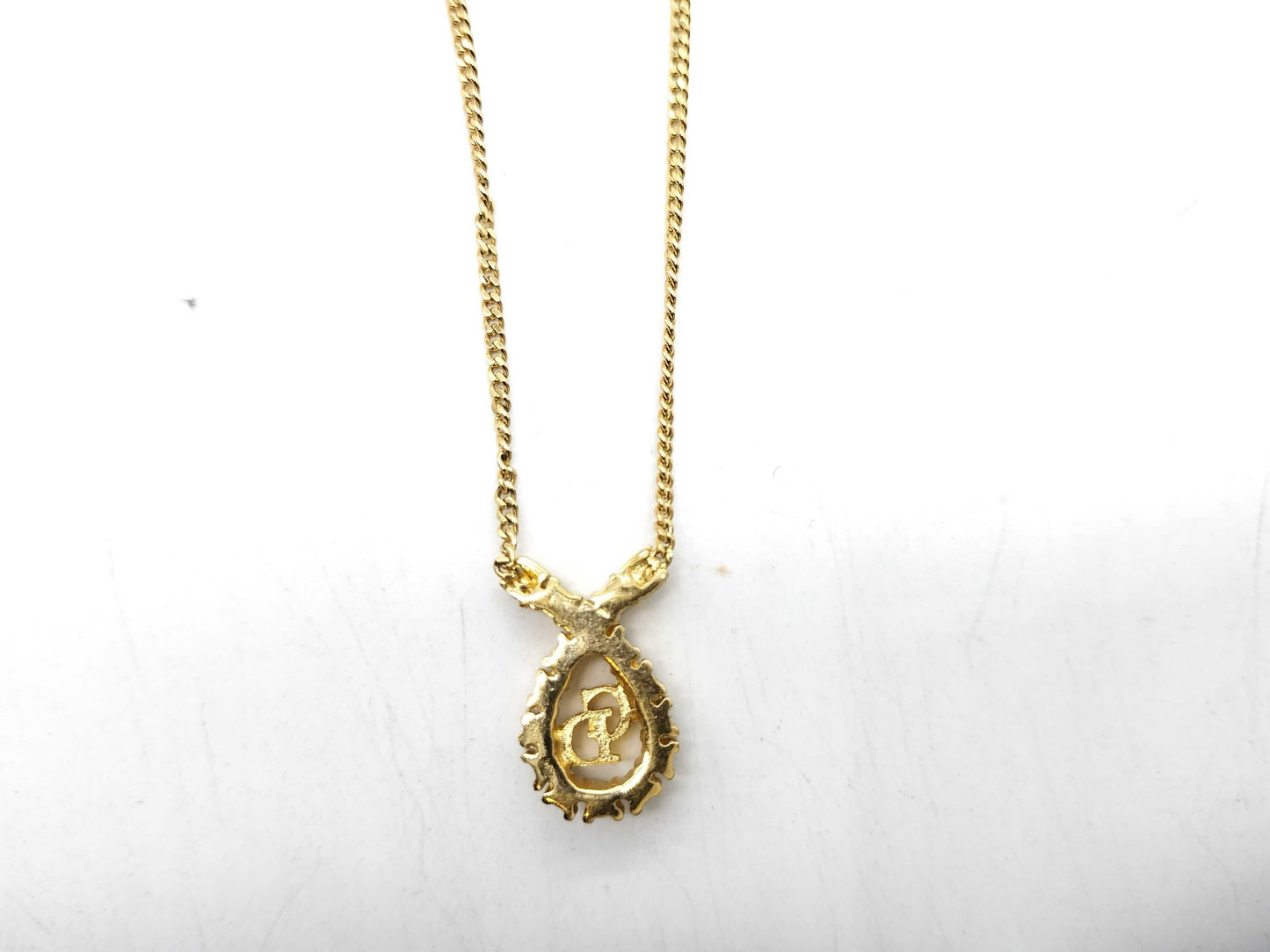 Dior CD logo necklace with rhinestones and gold accents