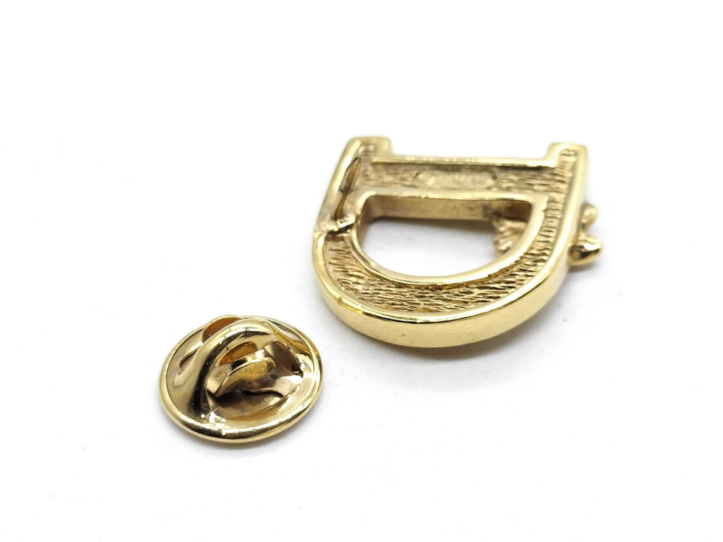 Dior logo brooch