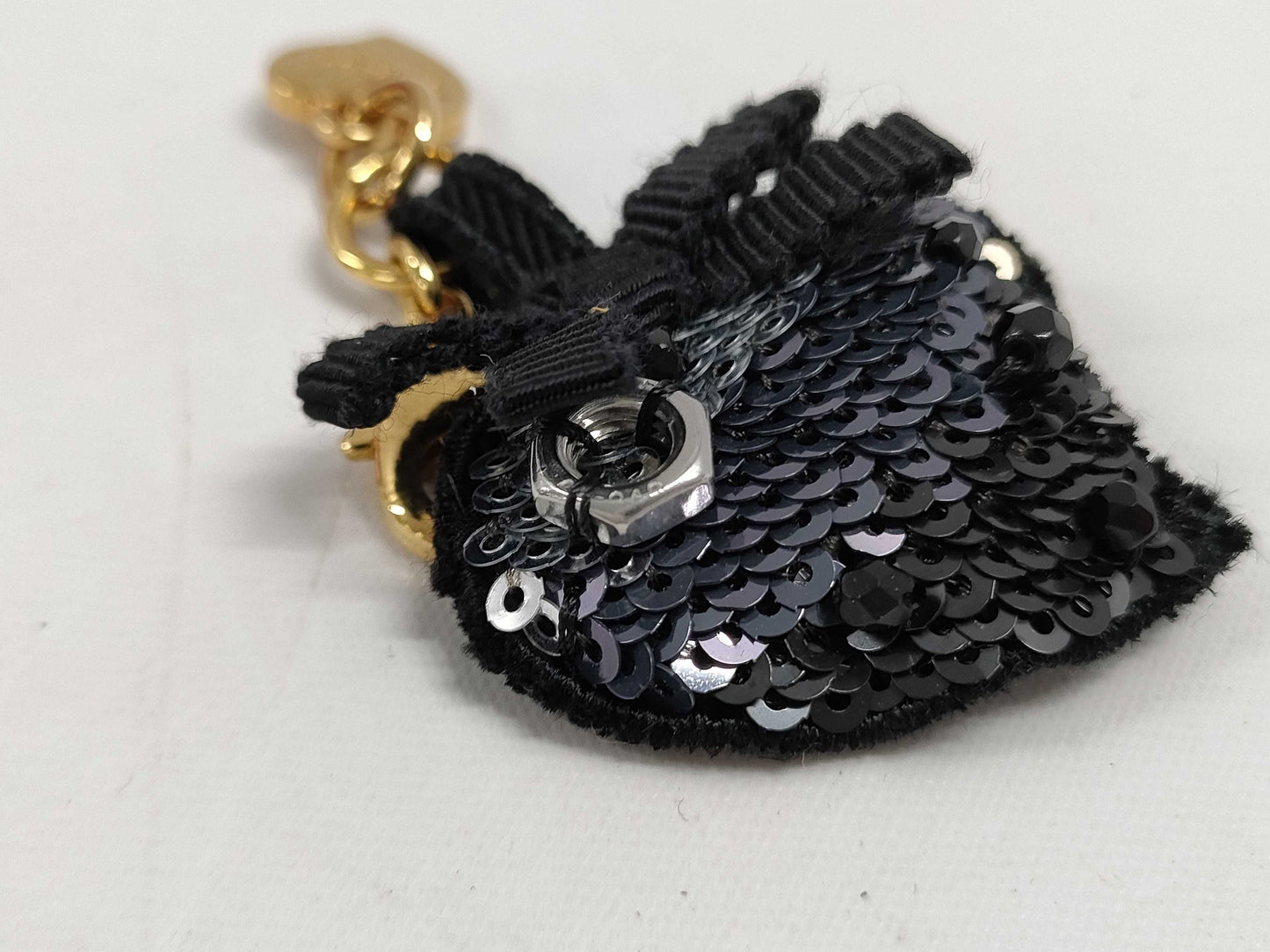 PRADA Charms and other accessories