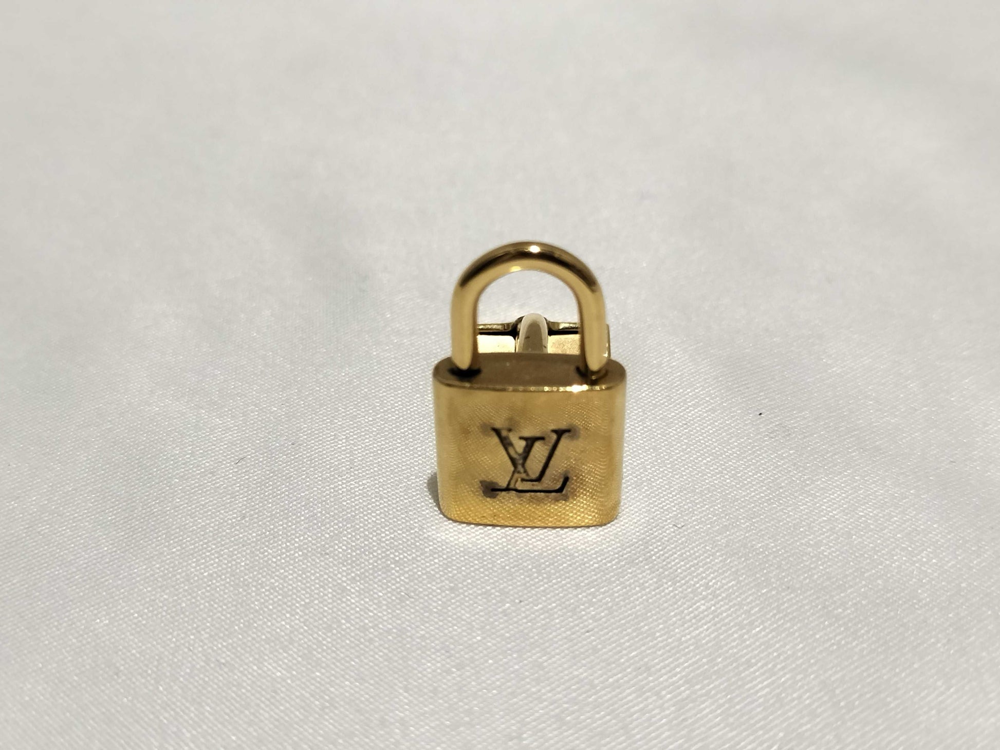 LOUIS VUITTON Padlock Cufflinks