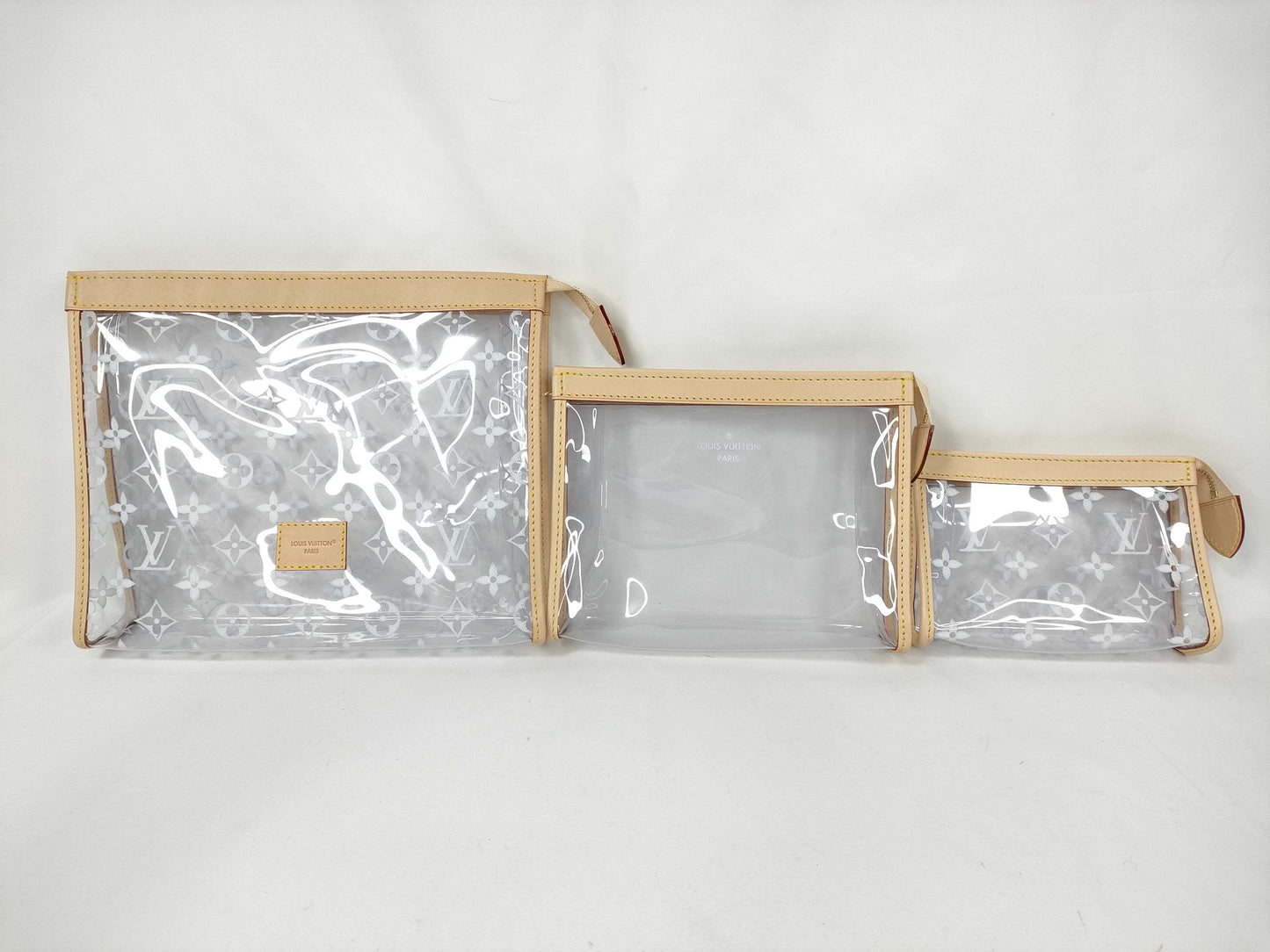 LOUIS VUITTON Monogram Vinyl Trio Toilette Pouch, Complete