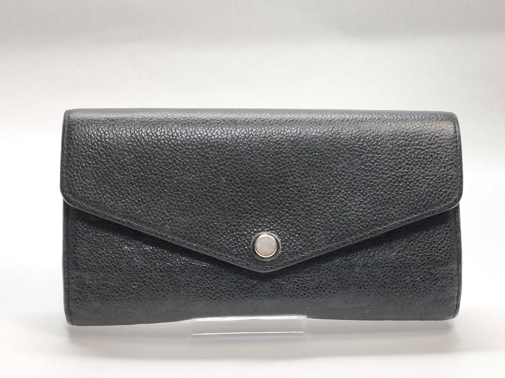 LOUIS VUITTON Monogram Empreinte Giant Monogram Reverse Portefeuille Zoe Wallet