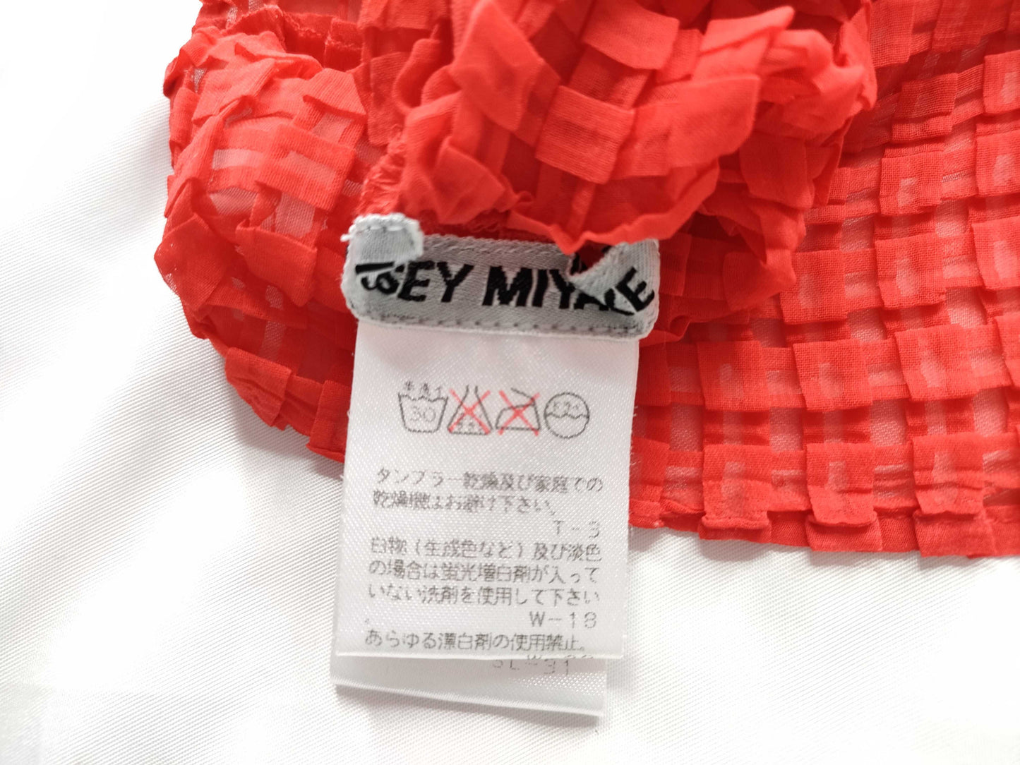 ISSEY MIYAKE sleeveless red top