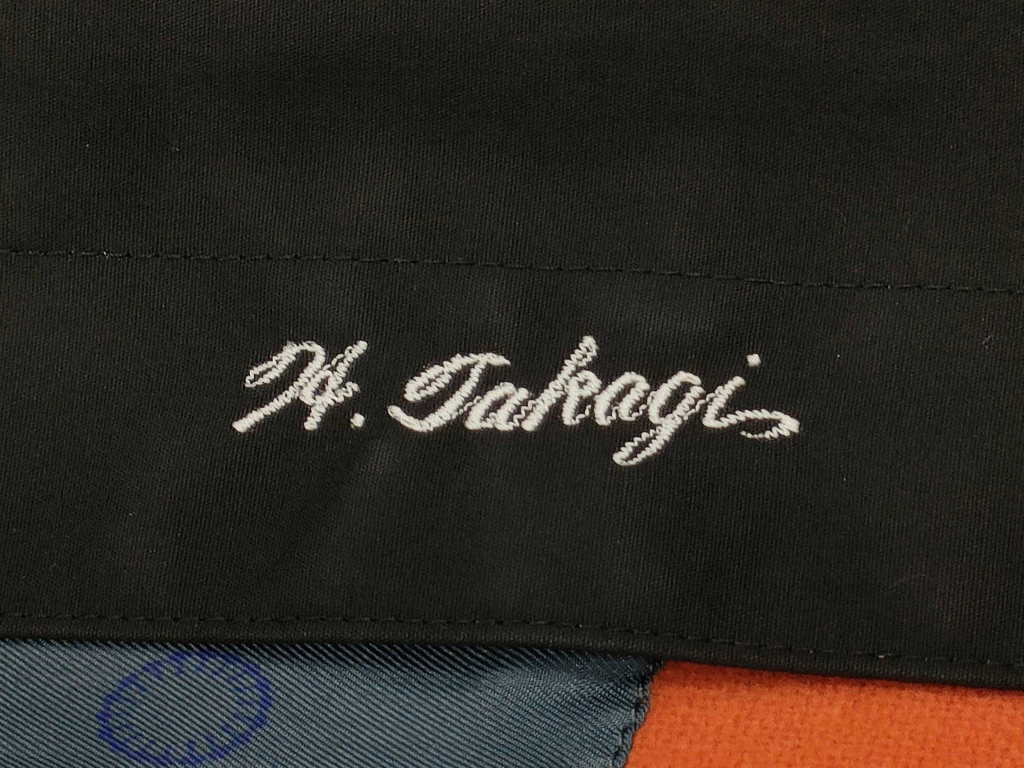 Mackintosh coat with name