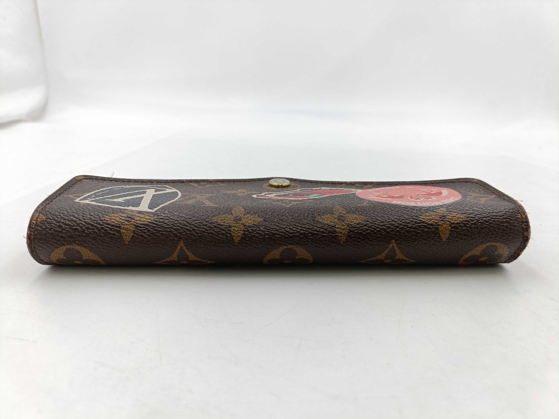 LOUIS VUITTON Monogram World Tour Portefeuille Sarah Wallet with Initials