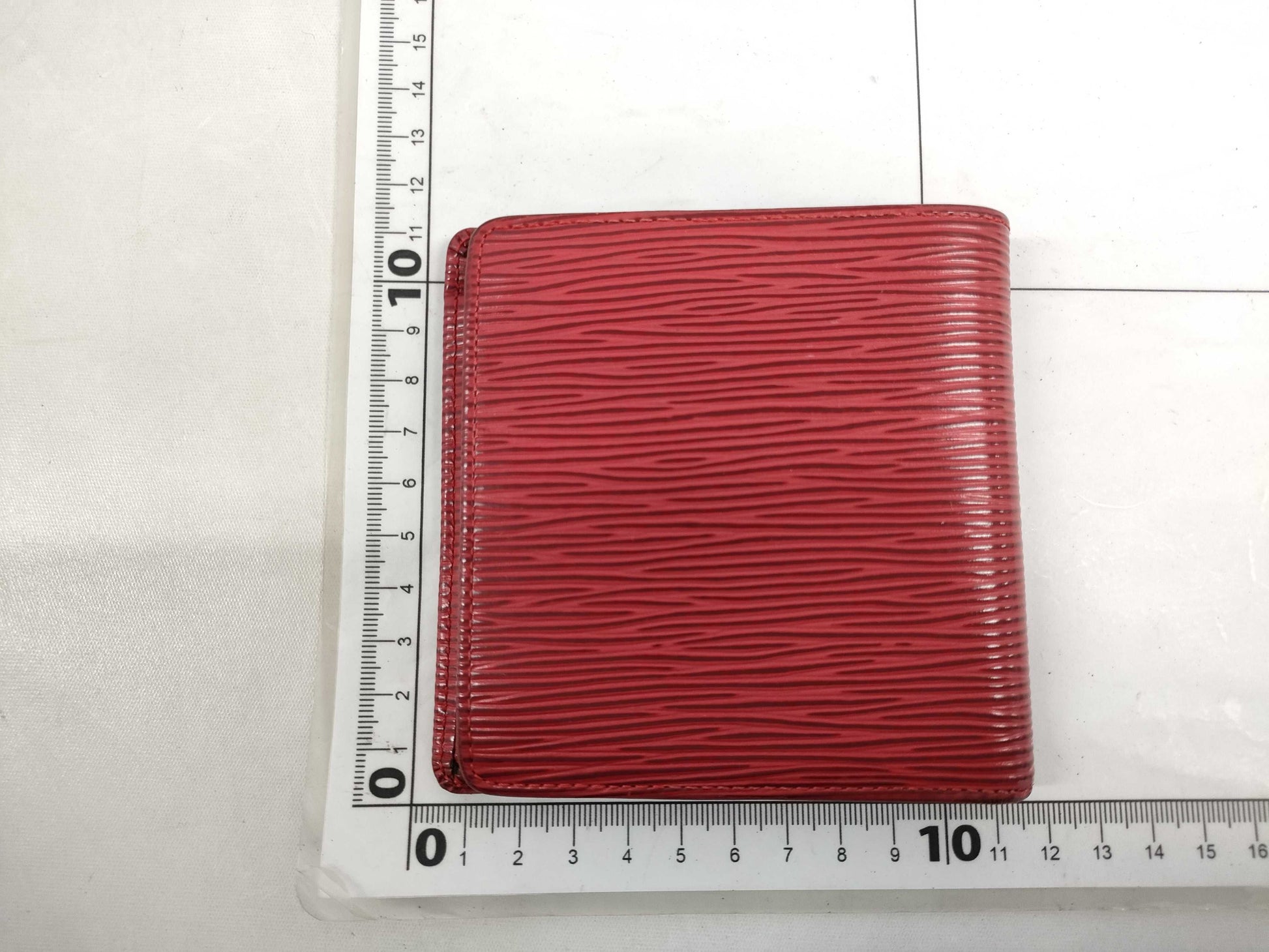 LOUIS VUITTON Epi folding wallet red