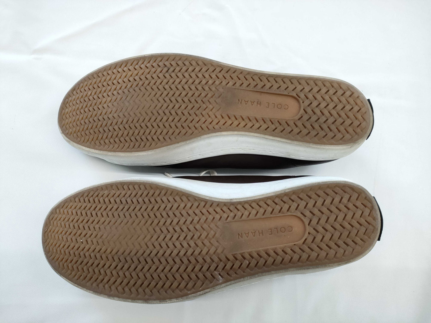 □ Cole Haan leather sneakers