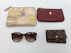 4 items including Armani, Louis Vuitton, Cartier, and Pucci sunglasses.