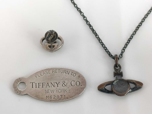 Tiffany & Co. 925 top/Gucci earrings/Vivienne Westwood necklace