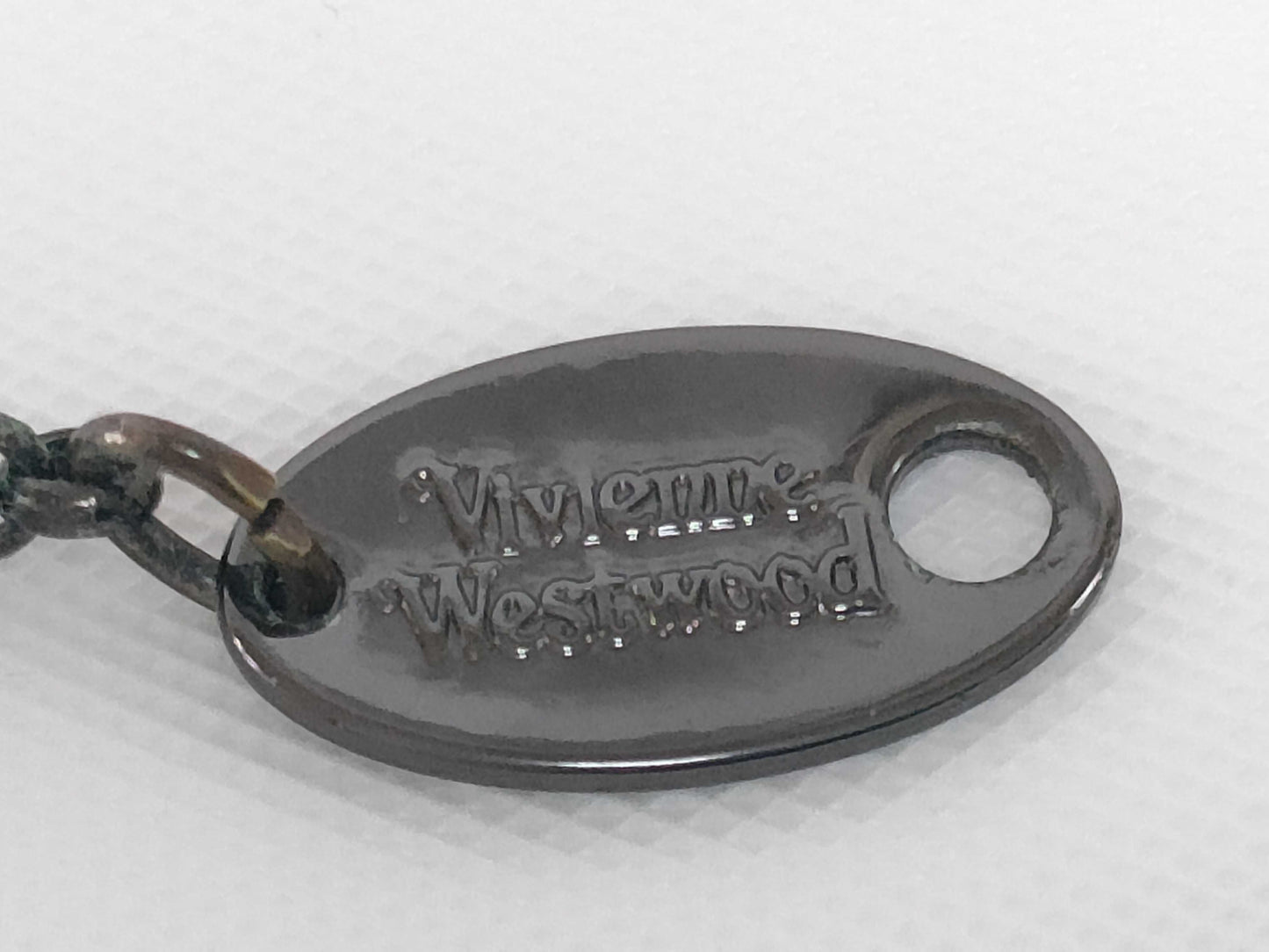 Tiffany & Co. 925 top/Gucci earrings/Vivienne Westwood necklace