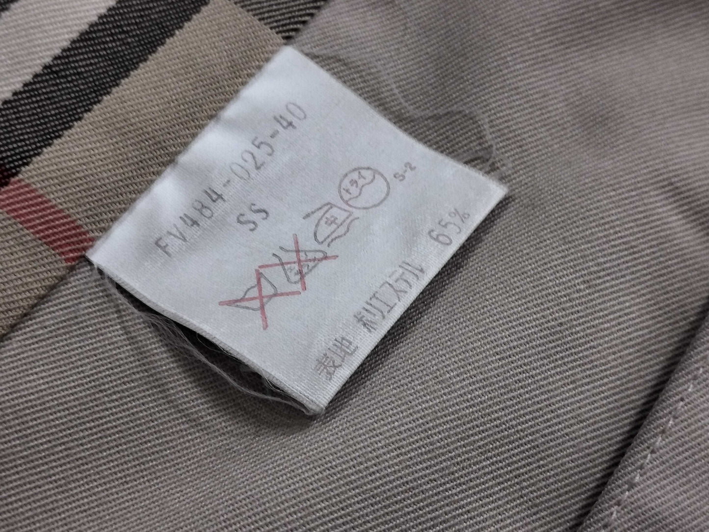 BURBERRY trench coat with stains