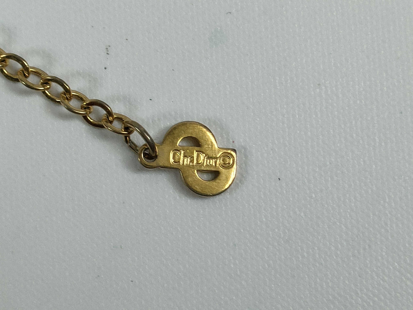 Dior logo necklace with stone and gold accents