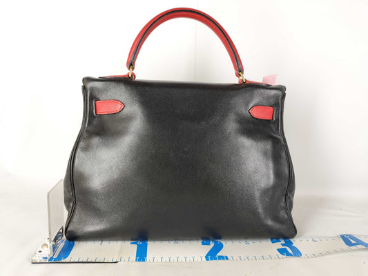 HERMES Kelly 32 Noir Shoulder Bag in Black and Red Calfskin with GP Hardware 