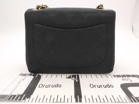 CHANEL Cotton Mini Matelasse 18 Shoulder Bag with Gold Hardware in Black