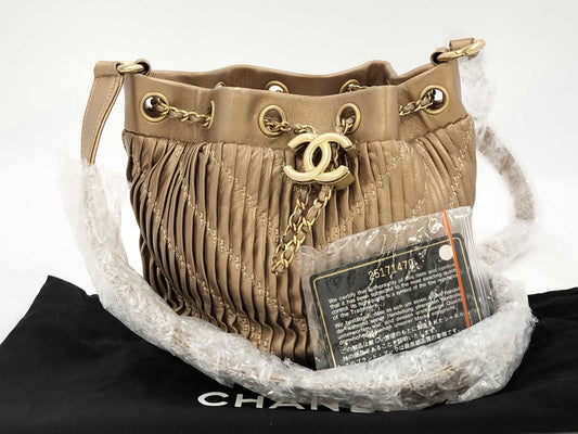 CHANEL CHANEL BAG CHEVRON BUCKET DRAWSTRING NO. 25 W/CARD METALLIC GOLD CROSSBODY 25171470 Shoulder Bag