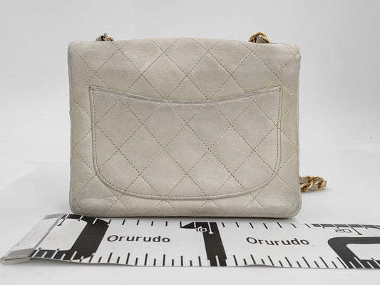 CHANEL Mini Matelasse Chain Shoulder Bag in White, Lambskin, 6216897