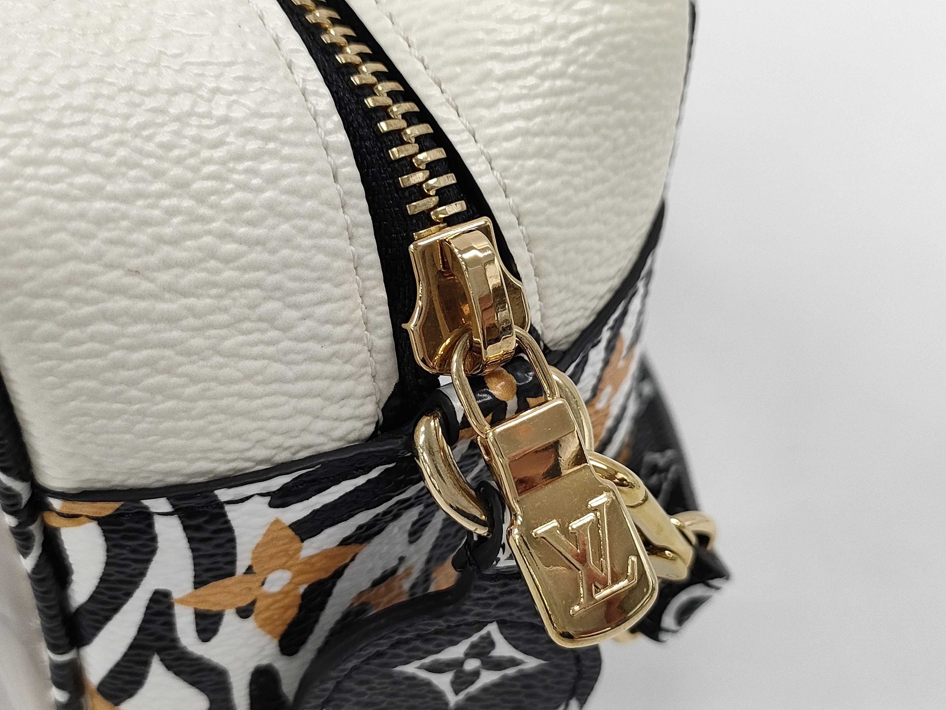 LOUIS VUITTON Jungle Beach Pouch Shoulder Bag in White with Multicolored and Gold Hardware, Monogram Canvas, M67883 TR2129 Shoulder Bag