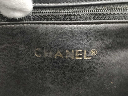 CHANEL Lamb Matelasse Turnlock Backpack