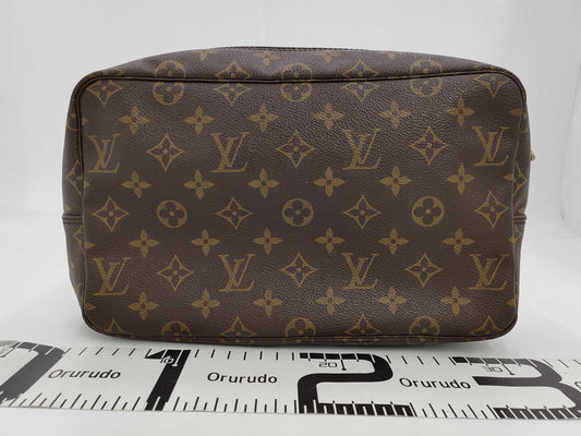 LOUIS VUITTON Monogram True Toilet Clutch Bag