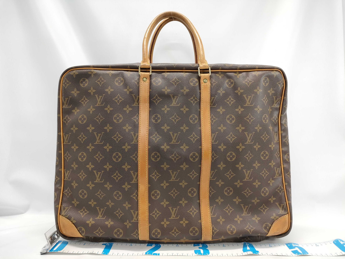 LOUIS VUITTON Monogram Sirius 55 Handbag