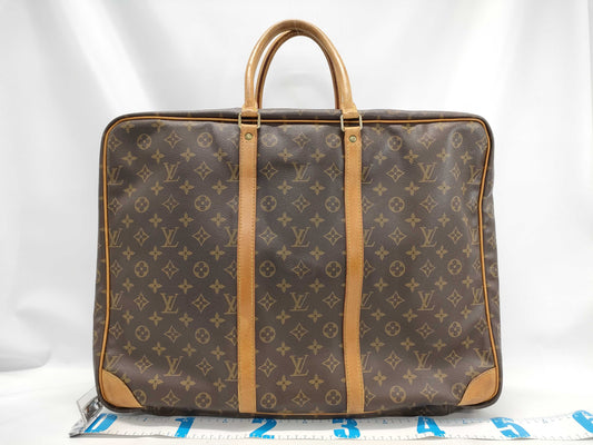 LOUIS VUITTON Monogram Sirius 55 Handbag