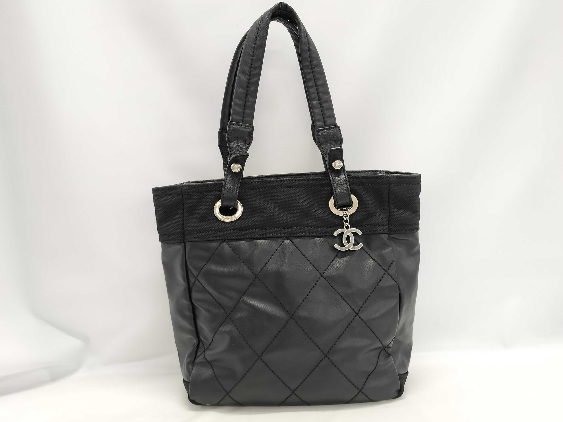 CHANEL Paris Biarritz Tote PM Coated Canvas Black with Silver Hardware A34208 Tote Bag