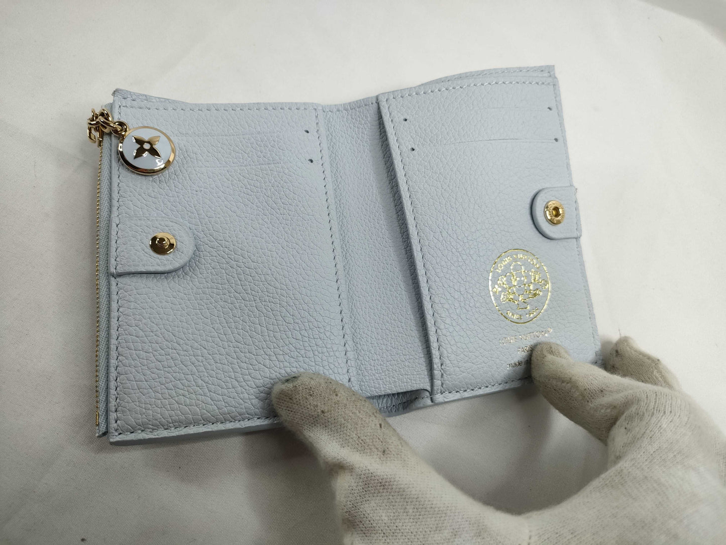 LOUIS VUITTON Brand new, unused Louis Vuitton Portefeuille Lisa in Azure Blue, Vivienne, with limited edition stamping, box, dust bag, wallet